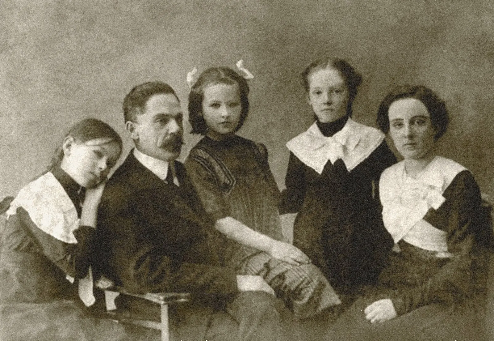 Dust and scratch removal: an example of a restored vintage portrait